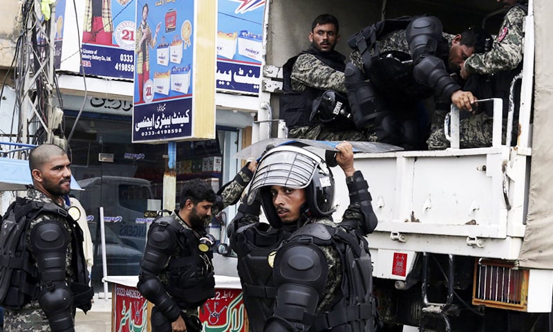 Paramilitary troops arrive in Lahore for maintenance of law and order in run-up to Nawaz Sharif and Maryam Nawaz's arrival at Lahore airport. ─ AP