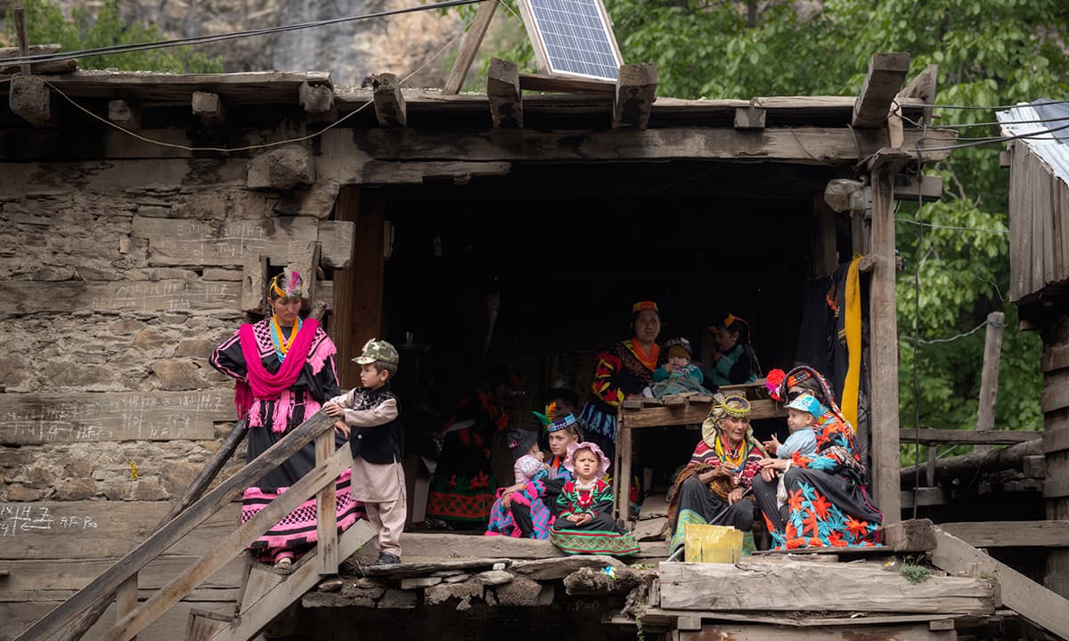 Locals watch spectators leave after the festival | Photos by Kohi Marri