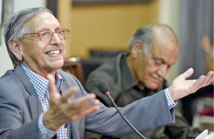 Poet Sarfraz Shahid and Anwer Masood at the event organised by Pakistan Academy of Letters on Thursday. &mdash; Photo by Tanveer Shahzad