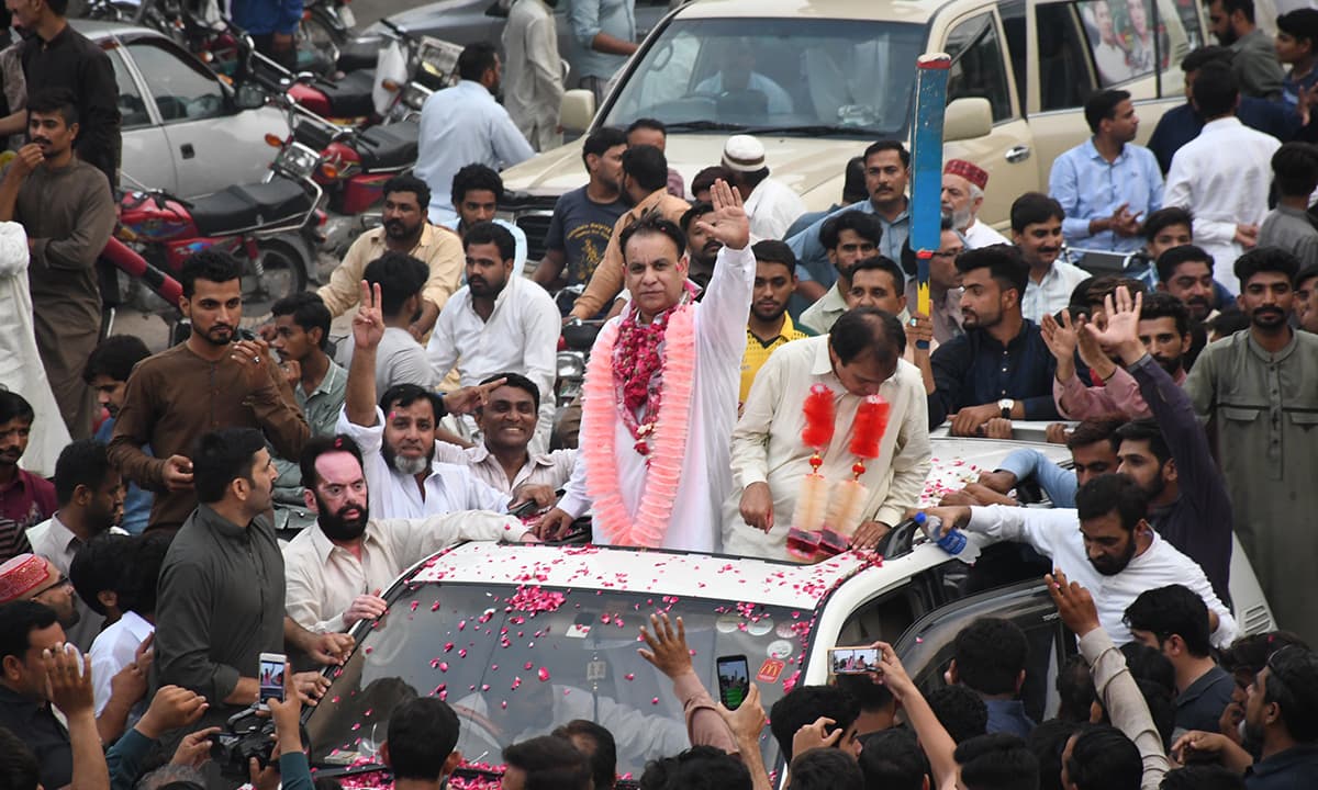 PTI candidate Sheikh Khurrum Shahzad for NA-107 in Faisalabad participates in a rally in his constituency | Rizwan Safdar