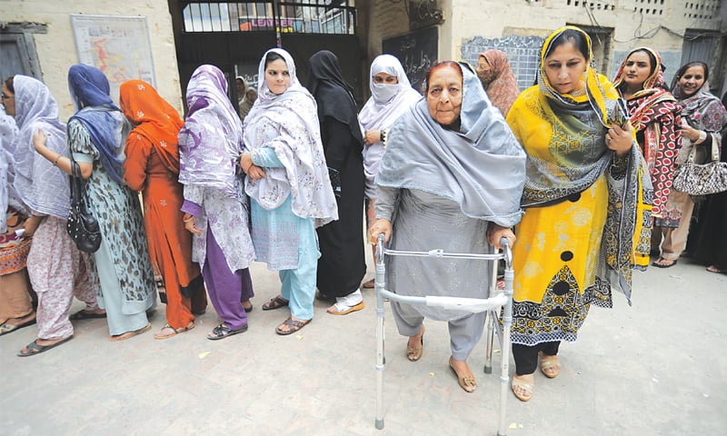 An elderly woman makes her way to the polling station | https://www.neweurope.eu