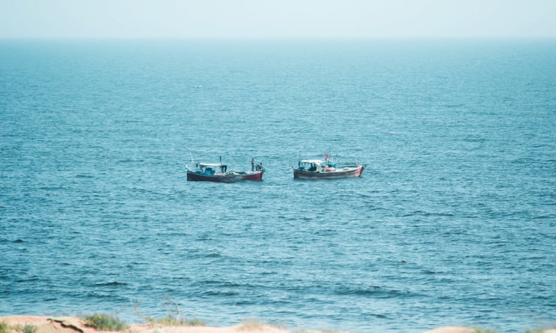 Fishing boats out at sea