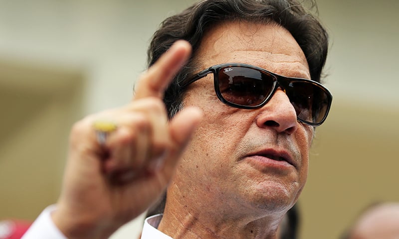 Imran Khan, chairman of Pakistan Tehreek-e-Insaf (PTI), speaks to members of media after casting his vote at a polling station during the general election in Islamabad, Pakistan, July 25, 2018. Photo: Reuters