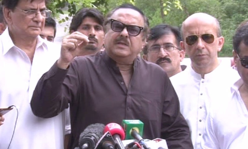 PTI's Naeemul Haq speaks to press. ─ DawnNewsTV