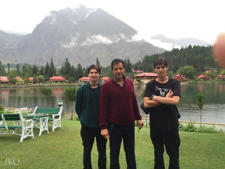 Imran Khan with his sons in Pakistan. They live with their mother in the UK. ─ File