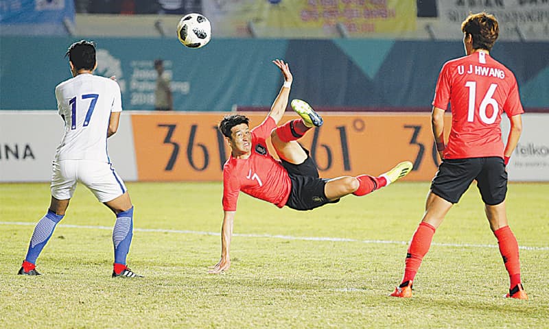 BANDUNG: South Korea&rsquo;s Son Heung Min has a shot at goal during their match against Malaysia at the Si Jalak Harupat Stadium on Friday.&mdash;AP