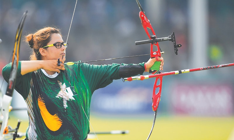 PAKISTAN’S Nabeela Kousar takes part in the recurve mixed team elimination round on Friday.—AFP