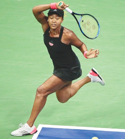 NEW YORK: Japan&rsquo;s Naomi Osaka returns a shot to Madison Keys of the US during the US Open semi-final.&mdash;AP