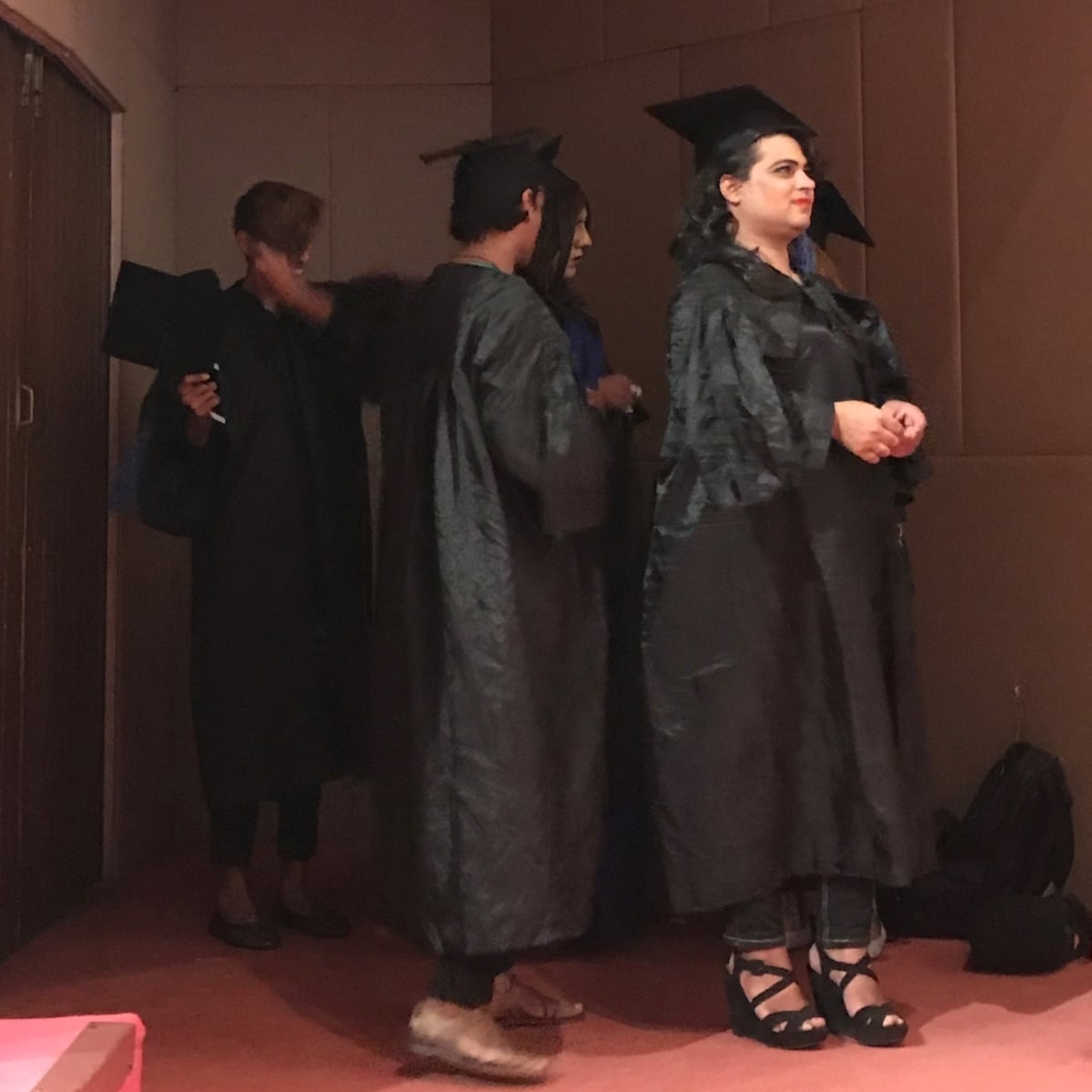 Graduating students lining up to receive their diplomas