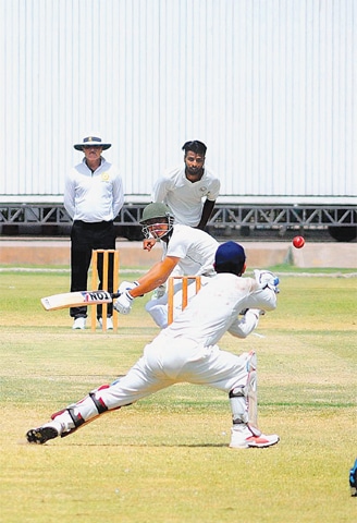 MULTAN: Wapda paceman Ehsan Adil bowls during the Quaid-i-Azam Trophy match against Multan at the Multan Cricket Stadium on Tuesday.—APP