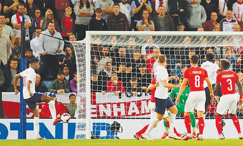 LEICESTER: England’s Marcus Rashford (L) shoots to score during the international friendly against Switzerland at the King Power Stadium.
—Reuters LEICESTER: England’s Marcus Rashford (L) shoots to score during the international friendly against Switzerland at the King Power Stadium.
—Reuters