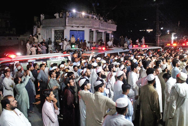 Locals stage a protest in Bely Baba, Shangla, against mine owner. — Dawn