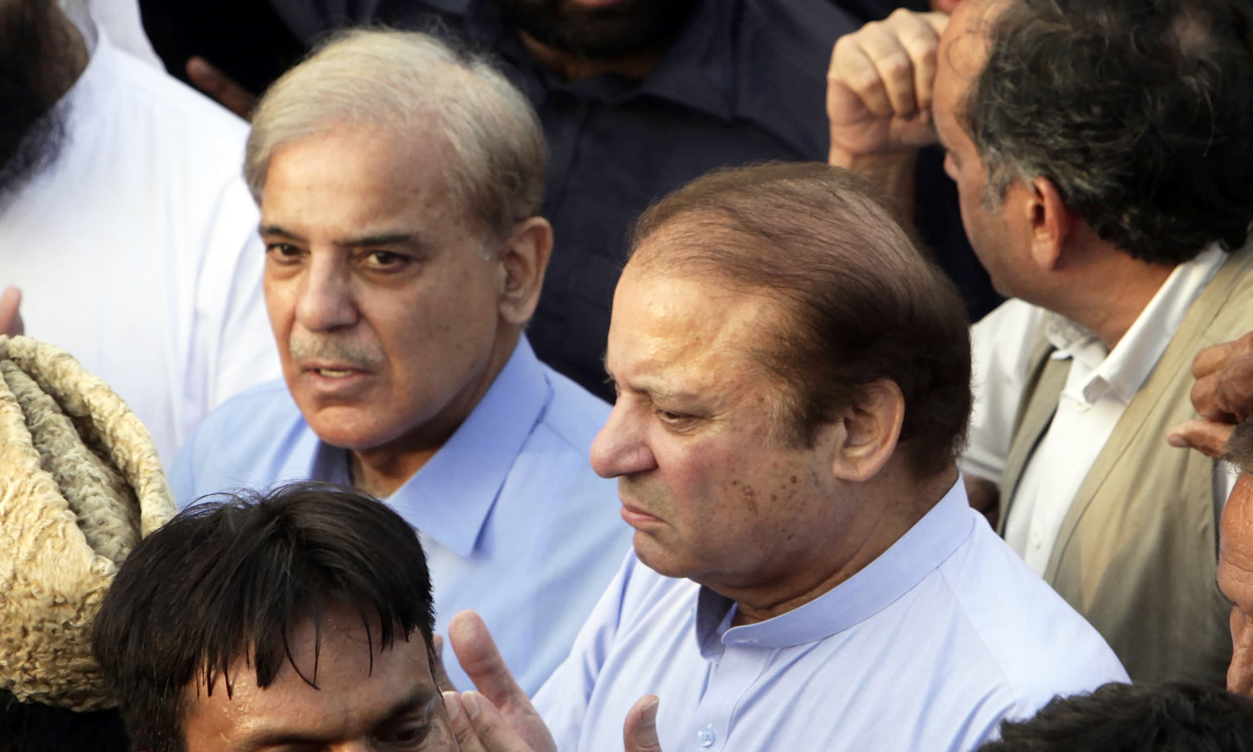 Nawaz Sharif prays during a funeral of his wife Kulsoom Nawaz. —AP