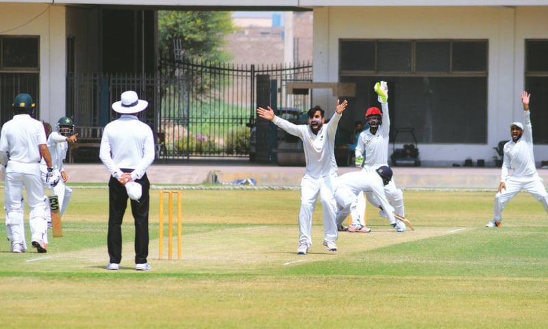 MULTAN: A Multan bowler appeals during the Quaid-i-Azam Trophy match against SSGC at the Multan Cricket Stadium on Tuesday.—APP MULTAN: A Multan bowler appeals during the Quaid-i-Azam Trophy match against SSGC at the Multan Cricket Stadium on Tuesday.—APP