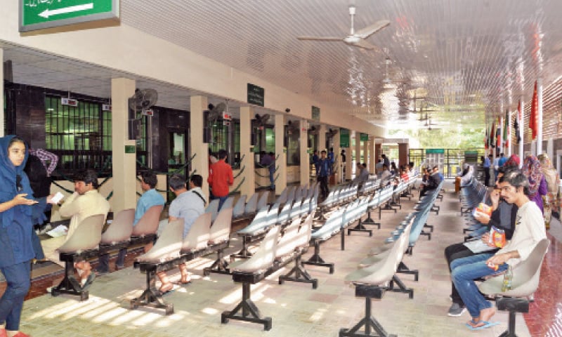 Students wait to be called to the counters.