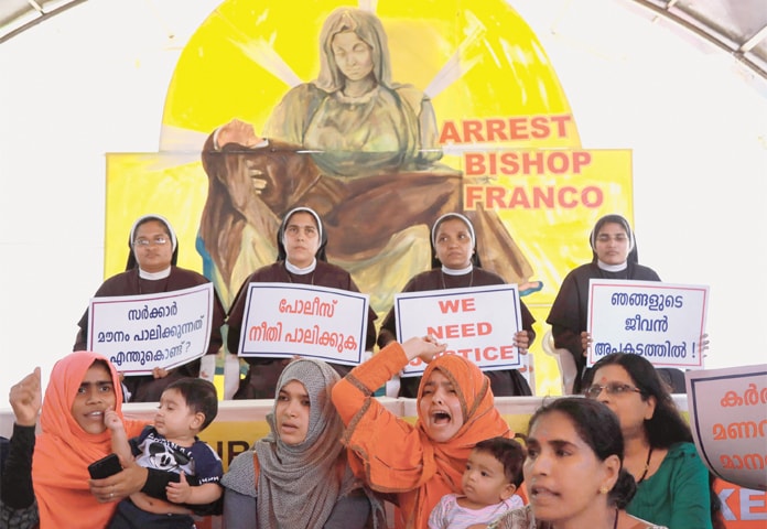 KOCHI (Kerala): Indian Christian nuns and Muslim supporters protest as they demand the arrest of Bishop Franco Mulakkal, who is accused of raping a nun, outside a high court.—AFP