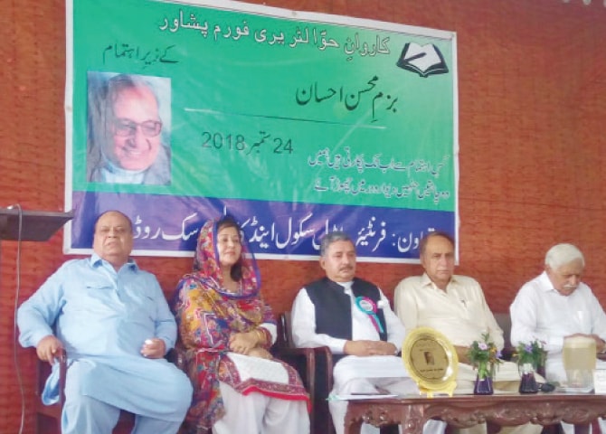 Guest speakers sitting on the stage at the literary function in Peshawar on Monday. &mdash; Dawn