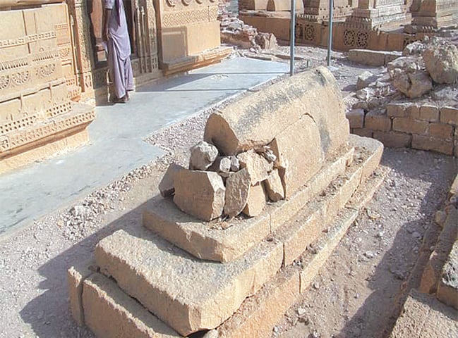 One of the vandalised graves in the mausoleum. &mdash; Dawn