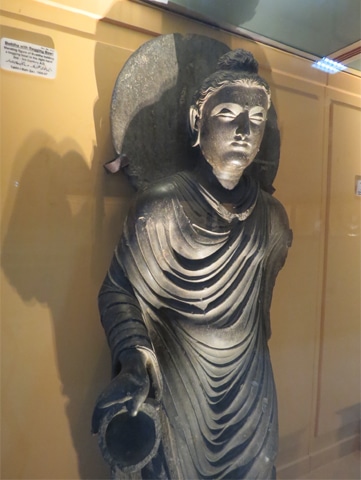 Buddha with a begging bowl