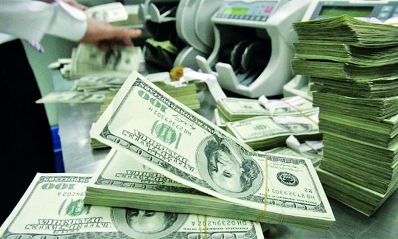 This file photo shows US Dollars being counted.