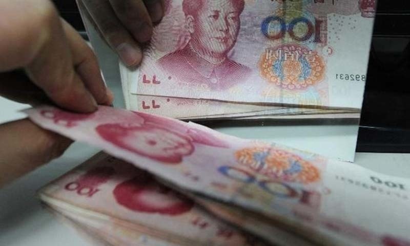 Beijing plans to maintain an ample level of liquidity amid tussle with US. ─ AFP/File