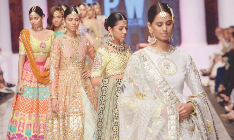 MODELS display a collection of dresses on day two of the Fashion Pakistan Week Winter/Festive ‘18.
—White Star MODELS display a collection of dresses on day two of the Fashion Pakistan Week Winter/Festive ‘18.
—White Star