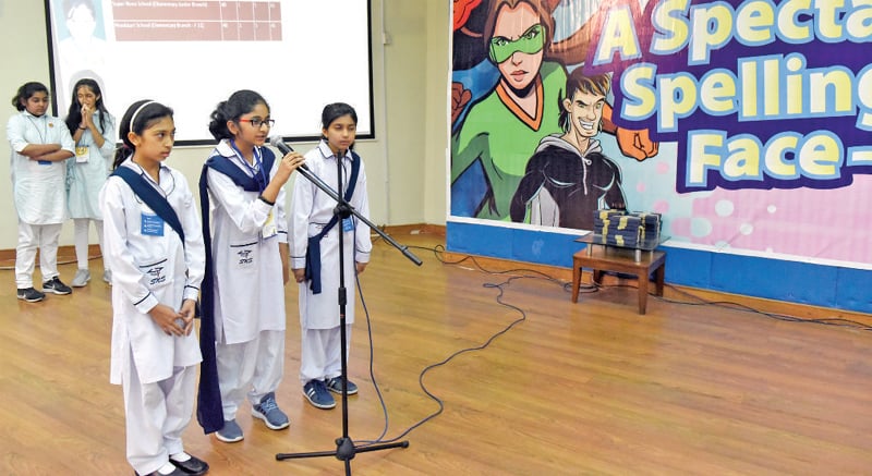 Students participate in the Dawn in Education Spelling Bee on Tuesday. &mdash; White Star