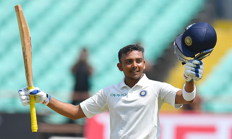 Shaw celebrates after scoring a century during the first Test cricket match between India and West Indies. &mdash; AFP