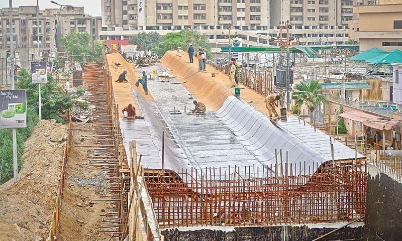 This file photo shows a track being constructed for a bus project.