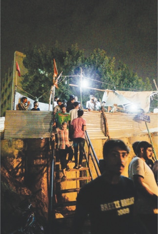 Metal stairs have been erected to enter the shrine