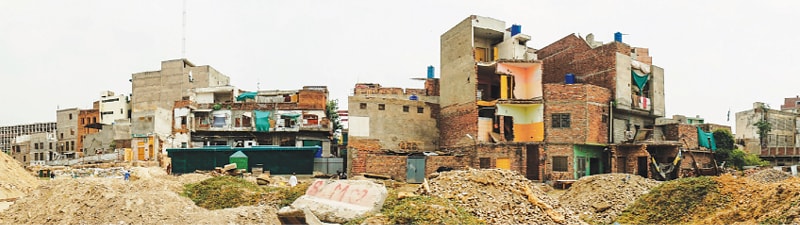 Buildings that have been damaged in the process of the construction of the Orange Line Metro Train