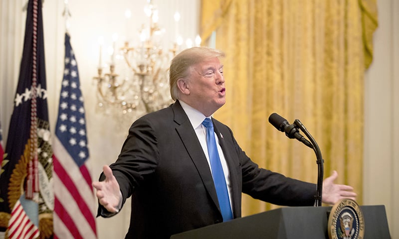 President Donald Trump speaks about the arrest in the mail bomb scare. &mdash;AP