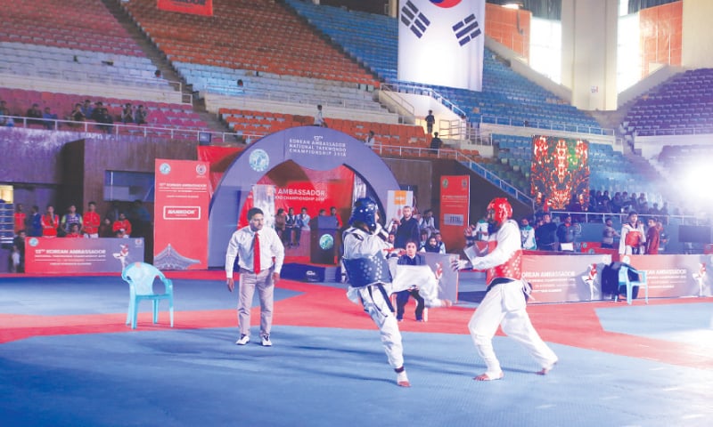 ISLAMABAD: Participants in action during the Korean Ambassador National Taekwondo Championship at the Pakistan Sports Complex on Monday. ISLAMABAD: Participants in action during the Korean Ambassador National Taekwondo Championship at the Pakistan Sports Complex on Monday.