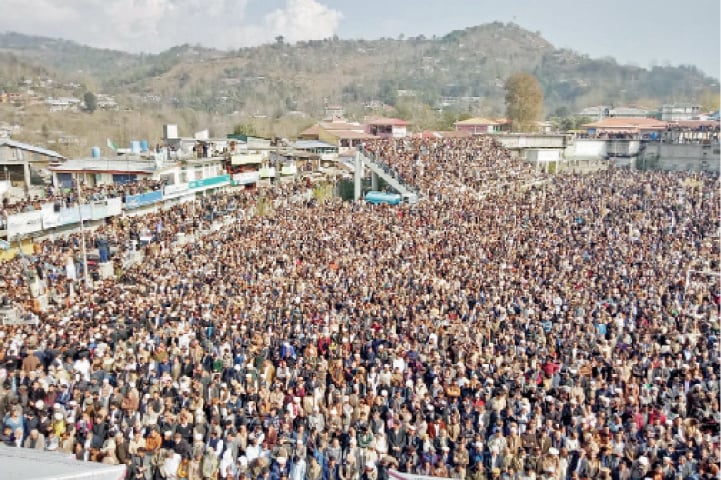 A large number of people attend the funeral of Sardar Khalid Ibrahim in Rawalakot on Monday. &mdash; Dawn