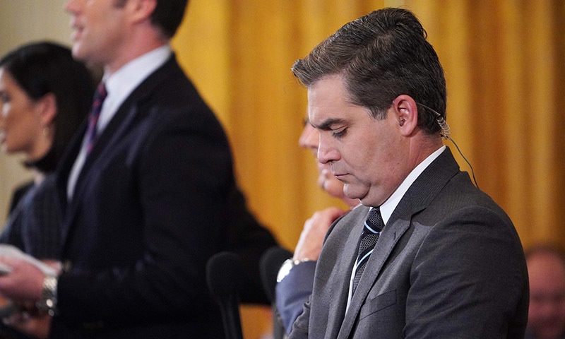 CNN chief White House correspondent Jim Acosta is seen before the start of a press conference by US President Donald Trump in the East Room of the White House in Washington, DC on November 7. &mdash; AFP