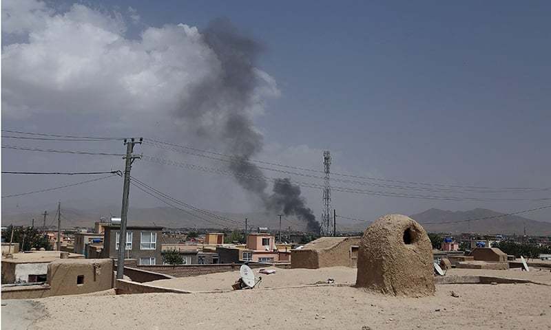 Smoke rising into the air after Taliban militants launched an attack on the Afghan provincial capital of Ghazni on August 10. — AFP/File photo