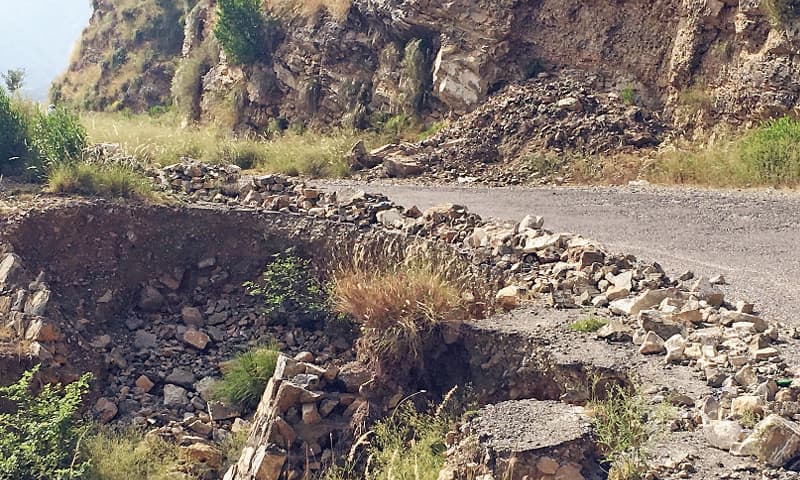 An eroding portion of Sirikot Bypass Road. — Dawn An eroding portion of Sirikot Bypass Road. — Dawn