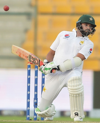 PAKISTAN batsman Azhar Ali avoids a short ball from New Zealand pacer Trent Boult on Friday.—AFP