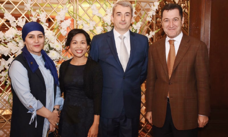 Ambassador Frederic Verheyden and Mrs Mookda Verheyden welcome the Tajik ambassador and his wife at the King’s Day of Belgium reception in Islamabad.