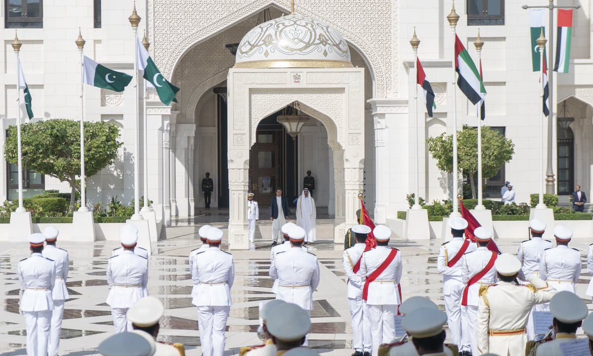 UAE Crown Prince Sheikh Mohamed bin Zayed and Prime Minister Imran Khan stand for the national anthem during a reception held at the Presidential Palace in Abu Dhabi. — Photo courtesy UAE Ministry of Presidential Affairs