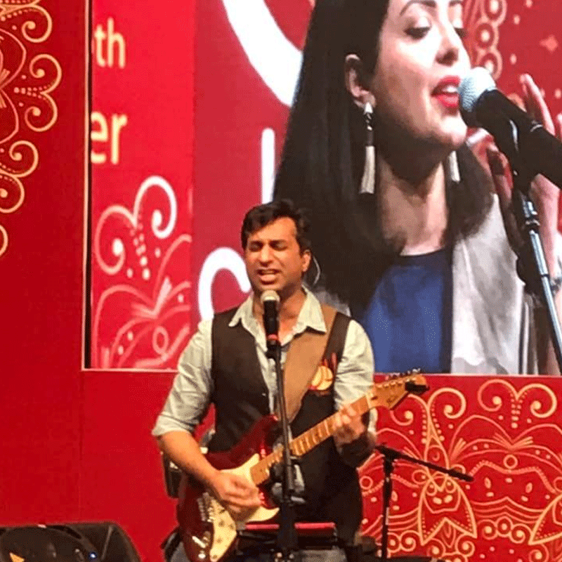 Rahman performing on stage at the Faiz International Festival.