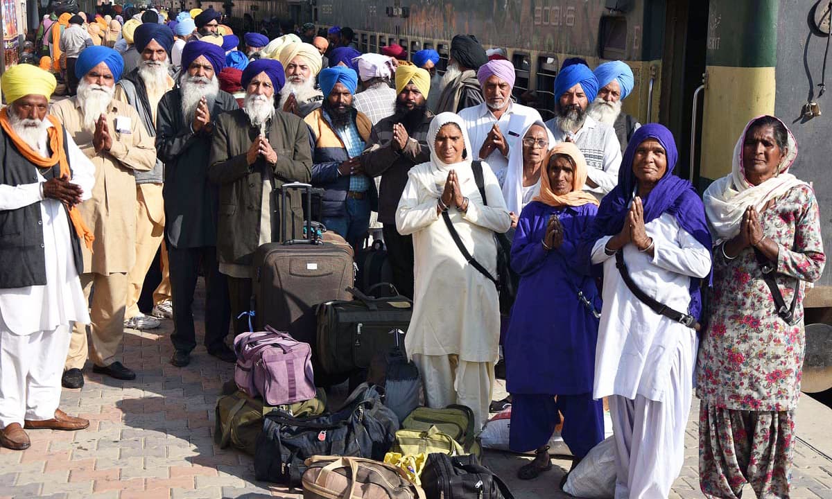 Sikh pilgrims arrive in Pakistan for Baba Guru Nanak's 549th birth anniversary celebrations. —APP