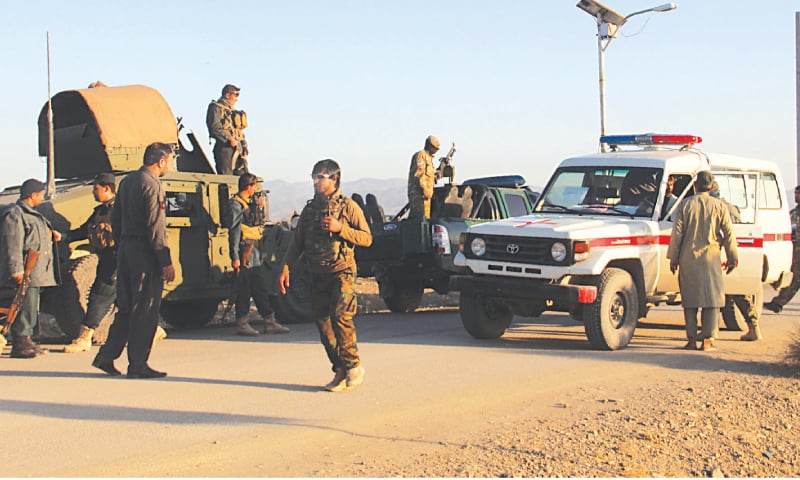 AFGHAN security forces arrive at the site after the suicide bomber blew himself up inside the packed mosque. &mdash; AFP