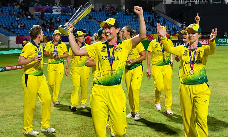 Australia's players celebrate winning the ICC Women's World T20 final cricket match against England at Sir Vivian Richards Cricket Ground, North Sound, Antigua and Barbuda. &mdash; AFP