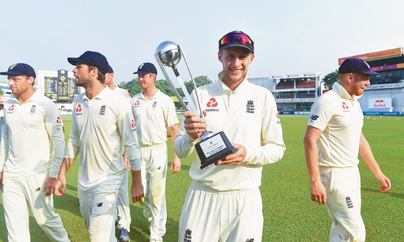 COLOMBO: England captain Joe Root poses with the trophy after his side beat Sri Lanka on Monday at the SSC Ground to complete a 3-0 sweep of the Test series. —AFP COLOMBO: England captain Joe Root poses with the trophy after his side beat Sri Lanka on Monday at the SSC Ground to complete a 3-0 sweep of the Test series. —AFP