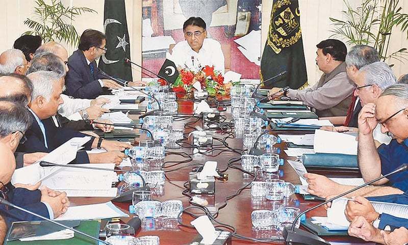 Finance Minister Asad Umar chairs ECC meeting. ─ File photo