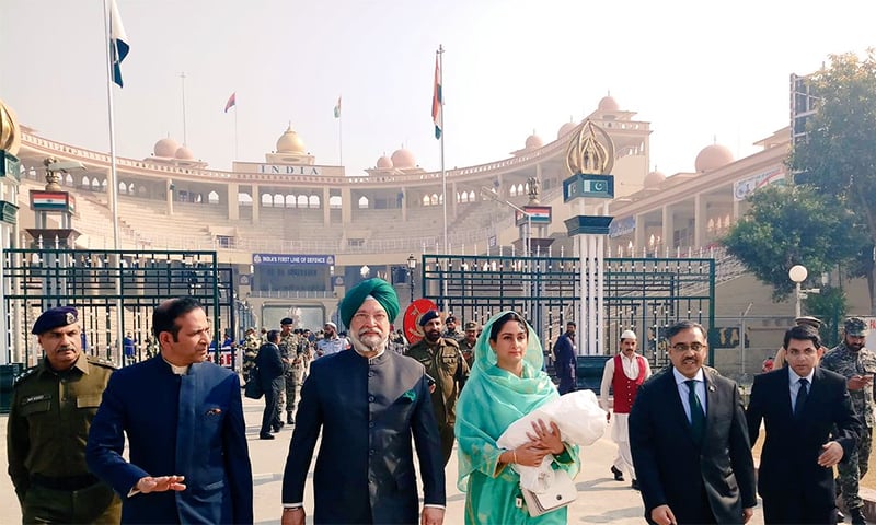 Indian Minister for Food Harsimrat Kaur Badal and Housing Minister Hardeep S. Puri at the Wagah Border in Lahore. ─ Photo courtesy PTV News Twitter