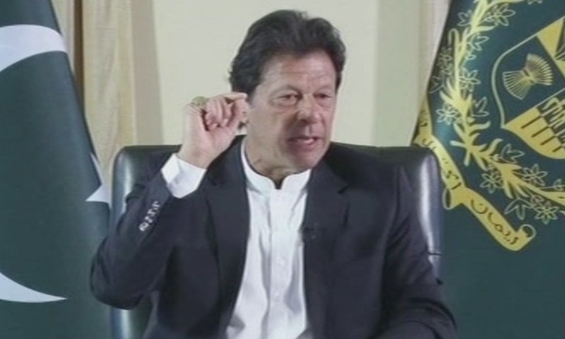 Prime Minister Imran Khan speaks during an interview with a group of journalists. — DawnNewsTV screengrab