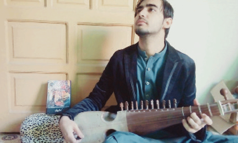 Saad Haider practising at his art room. &mdash; Dawn