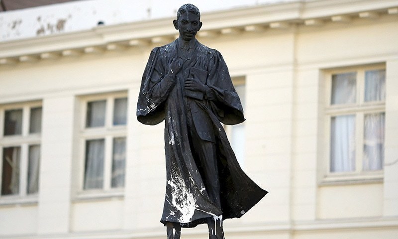 In this file photo, a statue of Mahatma Gandhi is seen after it was vandalised with white paint at Gandhi Square in Johannesburg on April 13, 2015. — Reuters